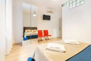 Postel nebo postele na pokoji v ubytování Muccino B&B