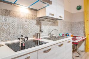 Kuchyň nebo kuchyňský kout v ubytování Muccino B&B + 8 fotografií