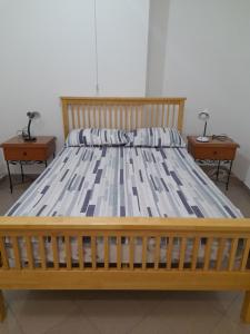 Postel nebo postele na pokoji v ubytování Rose Rooms