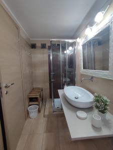 Ett badrum på Villa Verde Guest House