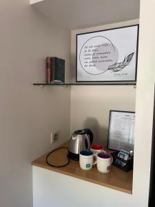 Příslušenství pro přípravu čaje a kávy v ubytování Inspirations - Chambres d'hôtes