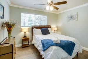 a bedroom with a bed and a ceiling fan at Welcoming South Lake Tahoe Rental Near Beaches in South Lake Tahoe