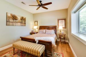 a bedroom with a bed and a ceiling fan at Charming Starkville Vacation Rental about 5 Mi to MSU! in Starkville