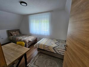 Postel nebo postele na pokoji v ubytování City View House