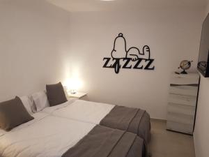Postel nebo postele na pokoji v ubytování Apartaments L’ARC