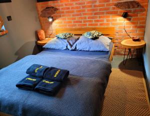 Posteľ alebo postele v izbe v ubytovaní Apartament SPOKOLOKO Mysliwski