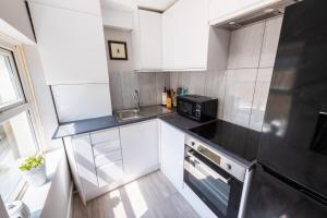 Η κουζίνα ή μικρή κουζίνα στο City Centre 4 Bed Holiday Home in Maidstone