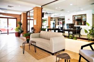 Гостиная зона в Hotel Colonial Playa del Carmen