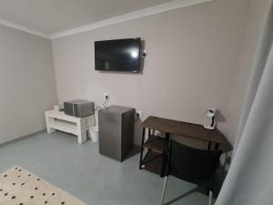 TV a/nebo společenská místnost v ubytování 19 on Gordon