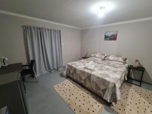 Postel nebo postele na pokoji v ubytování 19 on Gordon