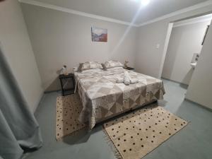 Postel nebo postele na pokoji v ubytování 19 on Gordon