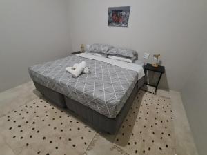 Postel nebo postele na pokoji v ubytování 19 on Gordon
