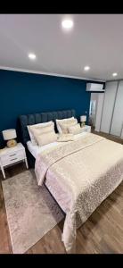 Posteľ alebo postele v izbe v ubytovaní Gold Luxury Room