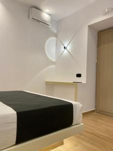 A bed or beds in a room at Asteras Cozy Stay