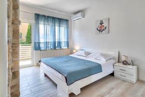 Posteľ alebo postele v izbe v ubytovaní VILLA Matija