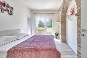 Posteľ alebo postele v izbe v ubytovaní VILLA Matija