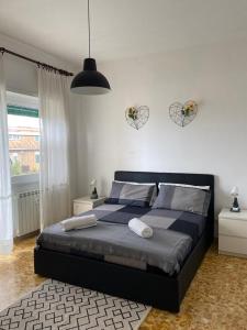 a bedroom with a large bed in a room at Pisana 247 St Peter in Rome