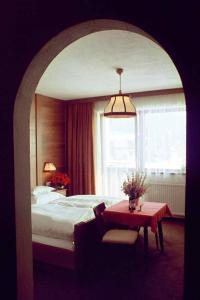 Un ou plusieurs lits dans un hébergement de l'établissement Hotel Menthof