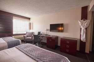 Ліжко або ліжка в номері Hotel Ruby Foo's