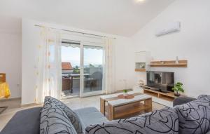 TV a/nebo společenská místnost v ubytování Apartman Antonio