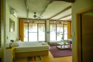 a bedroom with a bed and a living room at Hato San Pablo in Guayabal +157 photos