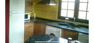 Dapur atau dapur kecil di Casa de turismo rural San Martín de valdetuejar
