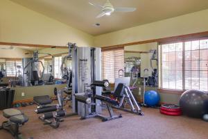 a gym with tread machines and exercise equipment in a room at Coeur dAlene Condo Rental 4 Mi to Lake Hayden! in Coeur d'Alene