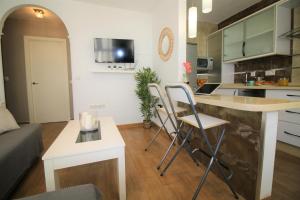 Kuchyňa alebo kuchynka v ubytovaní Descubre Málaga desde un Apartamento en su Centro Histórico