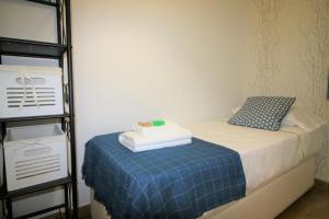 Posteľ alebo postele v izbe v ubytovaní Descubre Málaga desde un Apartamento en su Centro Histórico