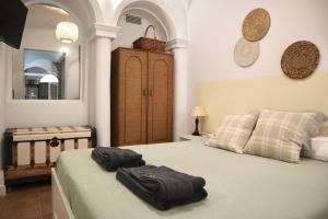 Cama o camas de una habitación en Atocha Boutique Badajoz