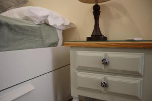 Cama o camas de una habitación en Atocha Boutique Badajoz