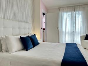 Säng eller sängar i ett rum på Dolce Basilico