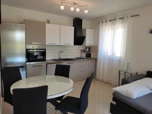 Kuchyň nebo kuchyňský kout v ubytování Grey House Zadar