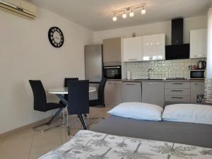 Kuchyň nebo kuchyňský kout v ubytování Grey House Zadar