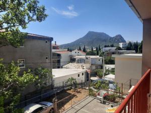 a view of a city from a balcony of a building at Villa Zorka in Sutomore