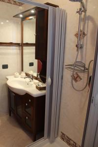 a bathroom with a sink and a shower at B&B Colle Sul Mare in Termoli