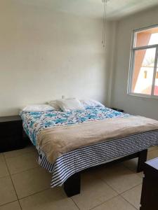 Ліжко або ліжка в номері Increible casa en renta en Cocoyoc Morelos