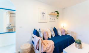 Posteľ alebo postele v izbe v ubytovaní Apartamento de un dormitorio cerca de la playa