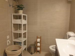 Baðherbergi á Seafront Apartment Strunjan