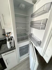 Kuchyň nebo kuchyňský kout v ubytování Flat 12 Palm Court