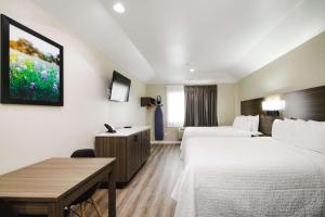Letto o letti in una camera di SureStay Studio by Best Western Conroe Downtown