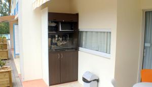 Cucina o angolo cottura di STUDIO FONCTIONNEL dans HOTEL CARAYOU SPA PISCINES