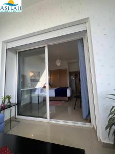 Letto o letti in una camera di Asilah Marina golf- Azur vue golf et mer