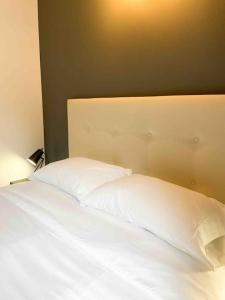 Moderno Y Rústico En Ransol 6pax l by BonesVacances tesisinde bir odada yatak veya yataklar