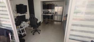 Kuchyň nebo kuchyňský kout v ubytování Confortable apartmento en Ricaurte cundinamarca