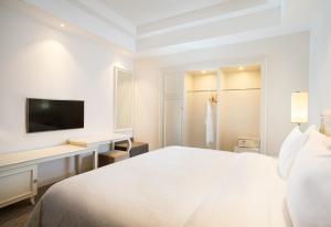 Postelja oz. postelje v sobi nastanitve Four Points by Sheraton Bandung