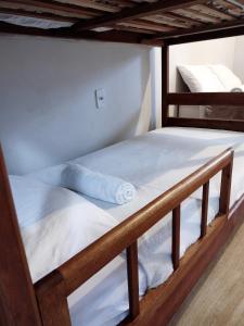 Postel nebo postele na pokoji v ubytování Hospedaje MorroSP
