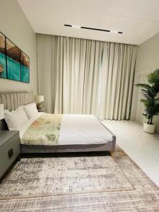 Postel nebo postele na pokoji v ubytování ِALMABEET Resort