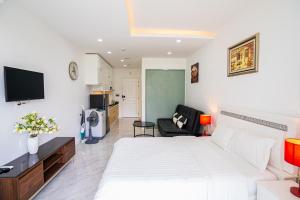 Μια τηλεόραση ή/και κέντρο ψυχαγωγίας στο Jack's Home - Ocean Vista Condotel Sealink Mui Ne