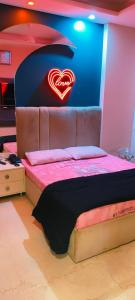 Ein Bett oder Betten in einem Zimmer der Unterkunft Vinanda Home Stay